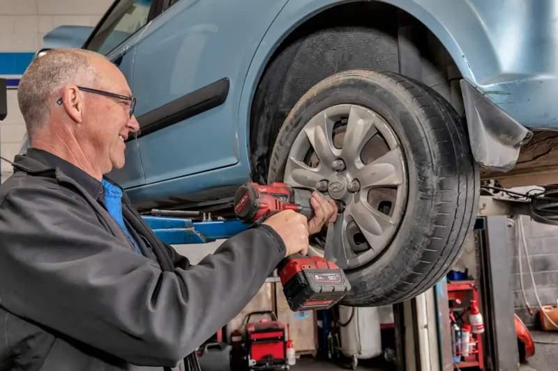 AutoCare fitting a tyre on vehicle